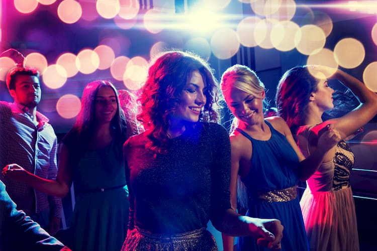 women dancing at a nightclub