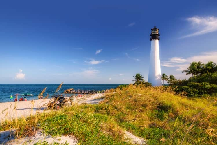 A daytime view of the Cape Florida Lighthouse in Miami, Florida