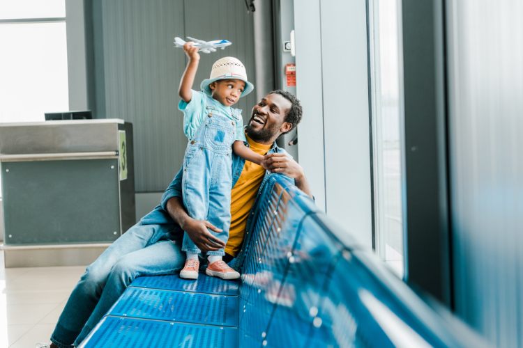 Father with son in airport