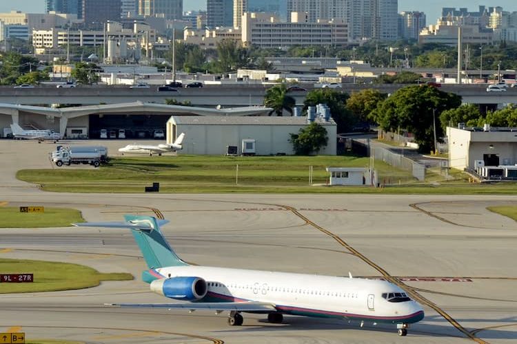 Fort Lauderdale skyline behind landed plane