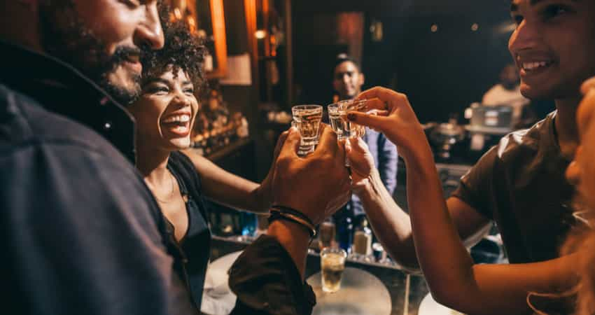 A group of friends drinking at a nightclub