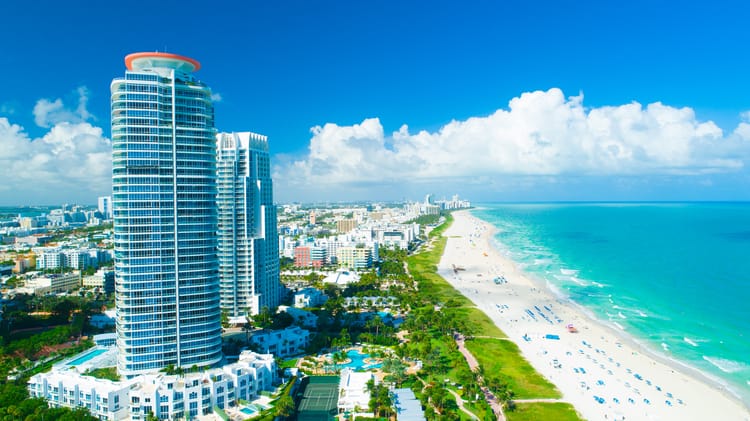 a view of some of miami's beachside highrises on a clear day